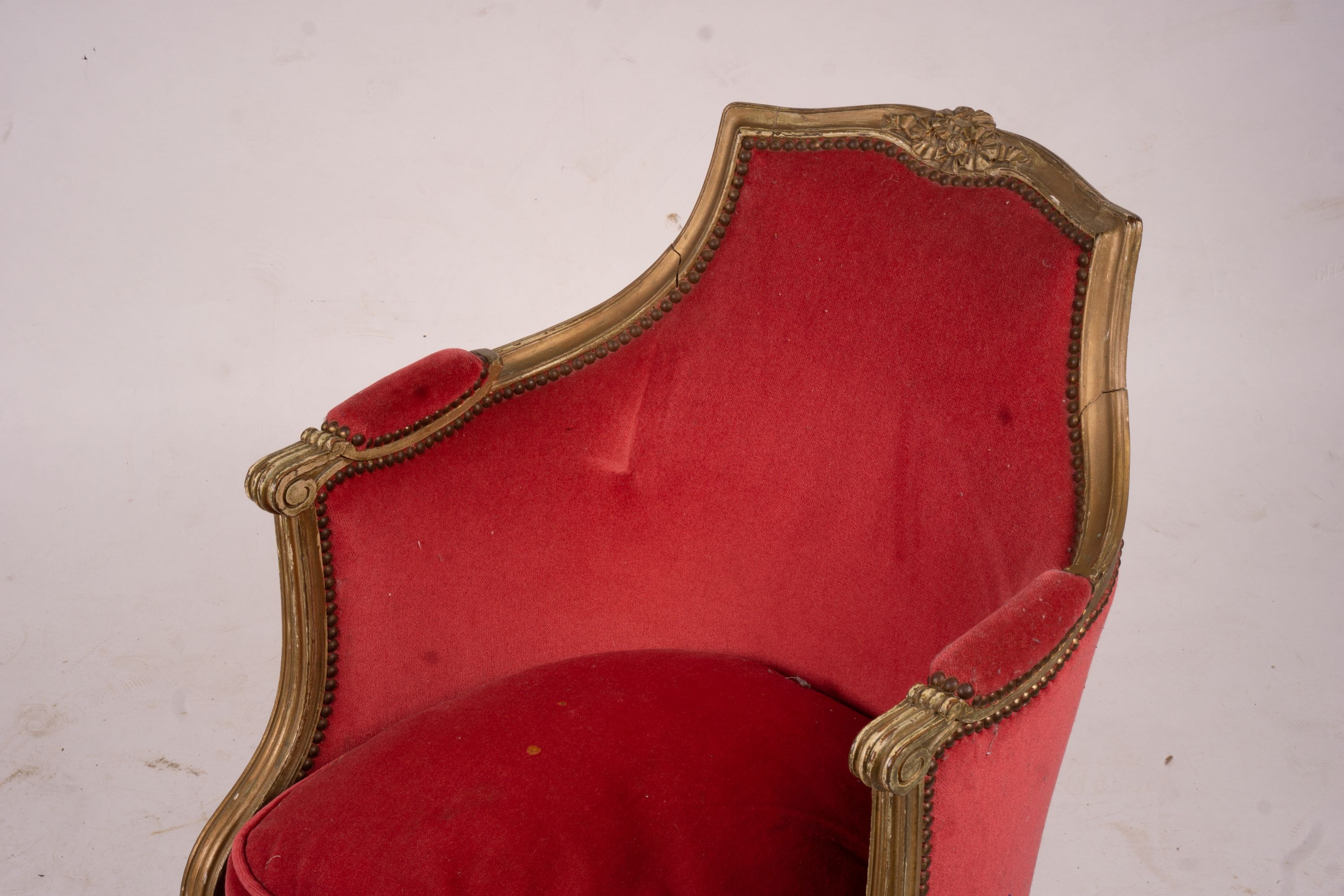 A late 19th century French giltwood tub shaped side chair, width 61cm, depth 62cm, height 78cm